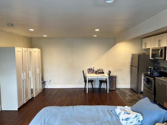 Dining room, Interior, Kitchen, Recessed Lighting, Stainless Steel Appliances, Wood Texture Flooring
