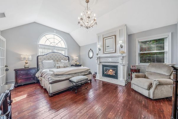 Bedroom, Chandelier, Fireplace, Interior, Wood Texture Flooring