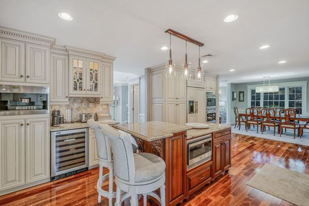 Dining room, Interior, Kitchen, Pendant Lights, Recessed Lighting, Stainless Steel Appliances, Wood Texture Flooring