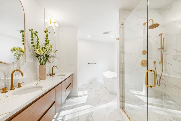 Bathroom, Dual Sink Vanities, Glass Shower, Interior, Marble, Marble Walls, Recessed Lighting