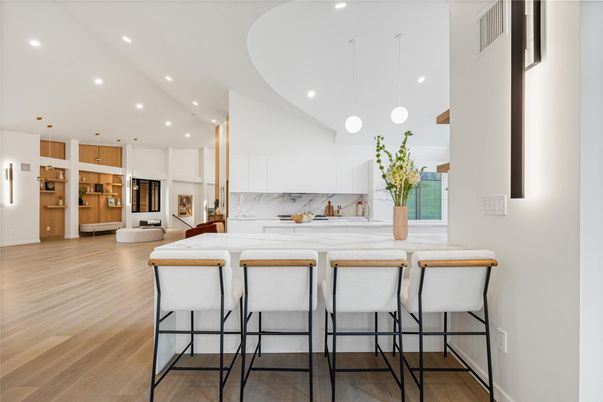 Interior, Kitchen, Marble Walls, Pendant Lights, Recessed Lighting, Stainless Steel Appliances, Wood Texture Flooring