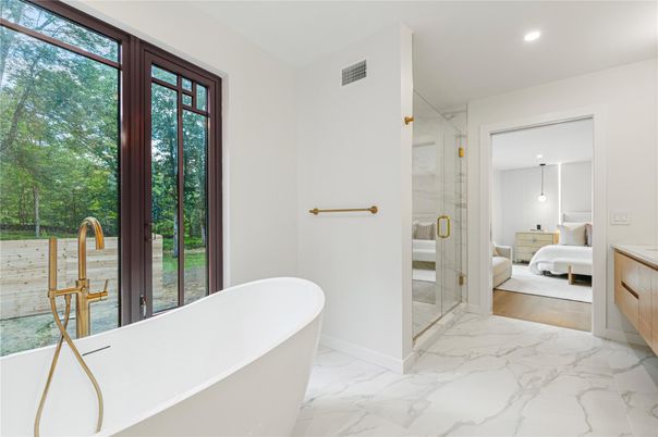 Bathroom, Bedroom, Free Standing Baths, Glass Shower, Interior, Marble, Marble Walls, Recessed Lighting, Wood Texture Flooring