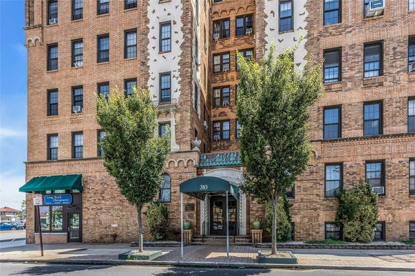 Exterior, Facade, Brick Facade, Condo Building