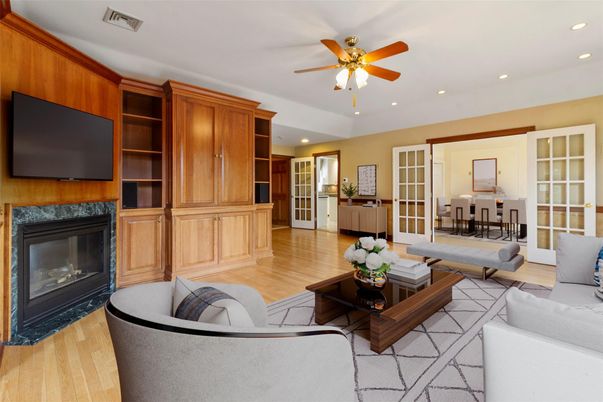 Dining room, Fireplace, Interior, Living room, Recessed Lighting, Wood Texture Flooring