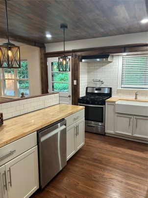 Interior, Kitchen, Pendant Lights, Recessed Lighting, Stainless Steel Appliances, Stone Walls, Wooden Ceilings, Wood Texture Flooring