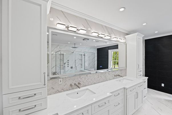 Bathroom, Dual Sink Vanities, Glass Shower, Interior, Marble, Marble Walls, Recessed Lighting