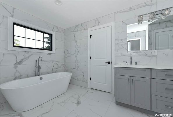 Bathroom, Free Standing Baths, Interior, Marble, Marble Walls, Recessed Lighting