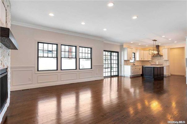 Empty room, Fireplace, Interior, Kitchen, Pendant Lights, Recessed Lighting, Wood Texture Flooring
