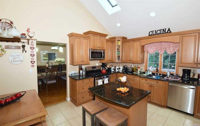 Dining room, Interior, Kitchen, Recessed Lighting, Stainless Steel Appliances, Wood Texture Flooring