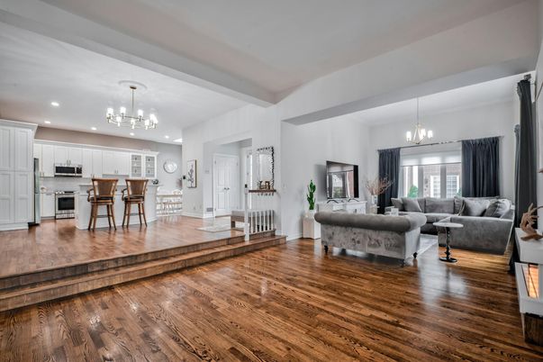 Chandelier, Interior, Kitchen, Living room, Pendant Lights, Recessed Lighting, Stainless Steel Appliances, Wood Texture Flooring