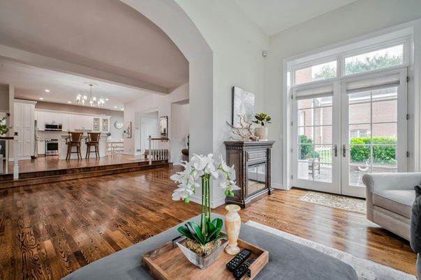 Chandelier, Fireplace, Interior, Kitchen, Pendant Lights, Recessed Lighting, Stainless Steel Appliances, Wood Texture Flooring
