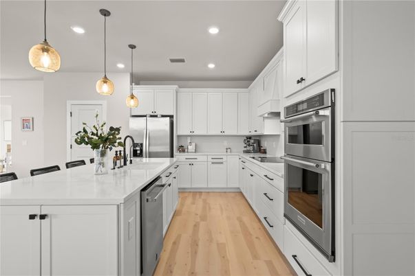 Interior, Kitchen, Pendant Lights, Recessed Lighting, Stainless Steel Appliances, Wood Texture Flooring