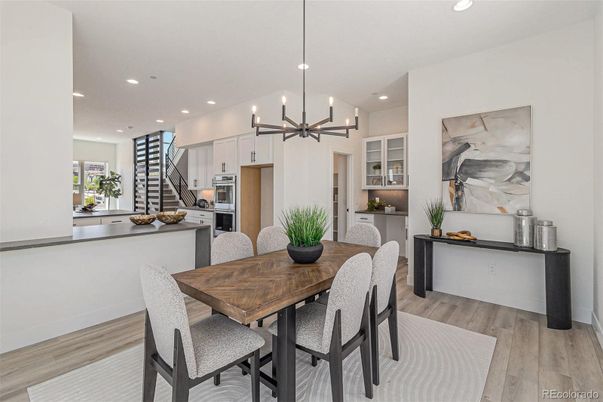 Dining room, Interior, Kitchen, Pendant Lights, Recessed Lighting, Stainless Steel Appliances, Wood Texture Flooring