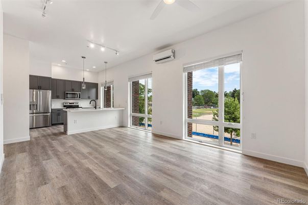 Empty room, Interior, Kitchen, Stainless Steel Appliances, Wood Texture Flooring