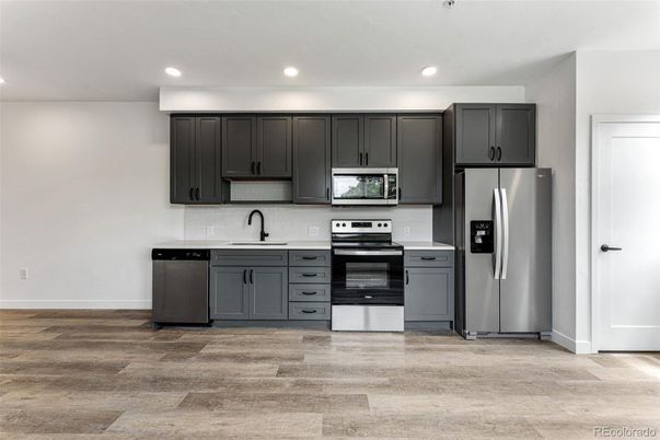 Interior, Kitchen, Recessed Lighting, Stainless Steel Appliances, Wood Texture Flooring