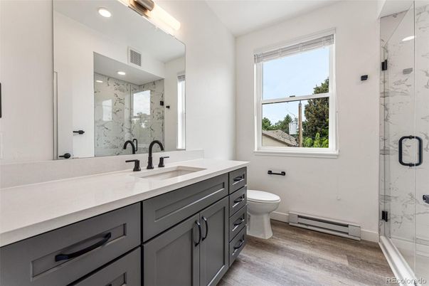 Bathroom, Glass Shower, Interior, Marble Walls, Recessed Lighting, Wood Texture Flooring