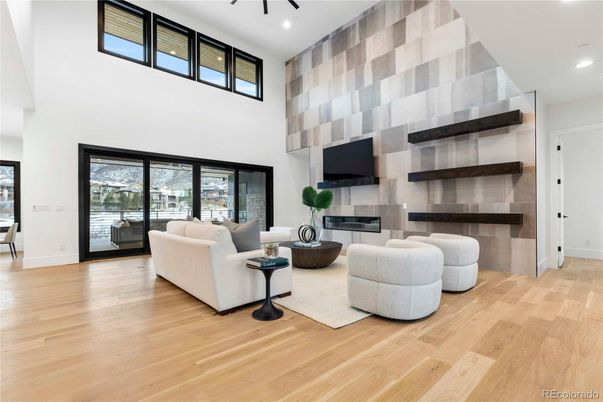 Fireplace, Interior, Living room, Recessed Lighting, Wood Texture Flooring