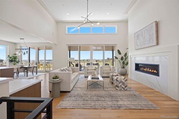 Dining room, Fireplace, Interior, Living room, Pendant Lights, Recessed Lighting, Water, Wood Texture Flooring