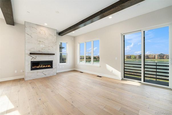 Empty room, Fireplace, Interior, Recessed Lighting, Wooden Beams, Wood Texture Flooring