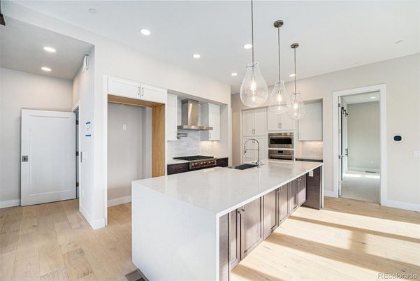 Interior, Kitchen, Pendant Lights, Recessed Lighting, Stainless Steel Appliances, Wood Texture Flooring