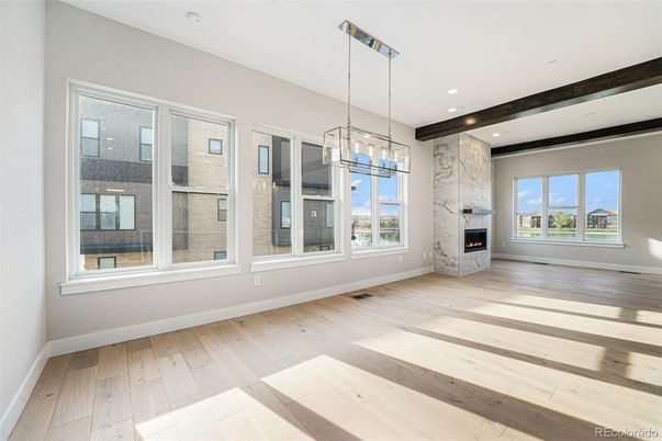 Empty room, Fireplace, Interior, Pendant Lights, Recessed Lighting, Wood Texture Flooring