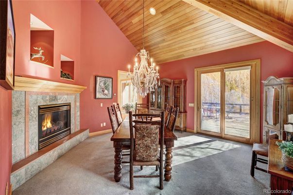 Chandelier, Dining room, Fireplace, Interior, Wooden Ceilings