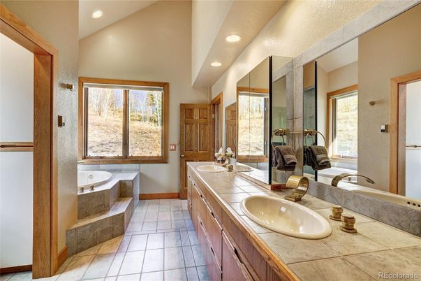 Bathroom, Dual Sink Vanities, Interior, Recessed Lighting, Tile Countertops