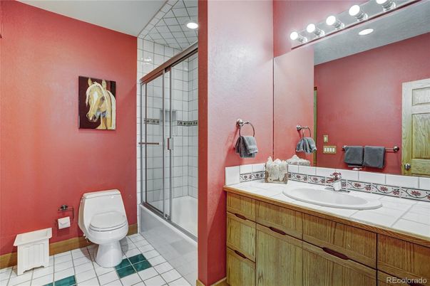 Bathroom, Glass Shower, Interior, Recessed Lighting, Tile Countertops