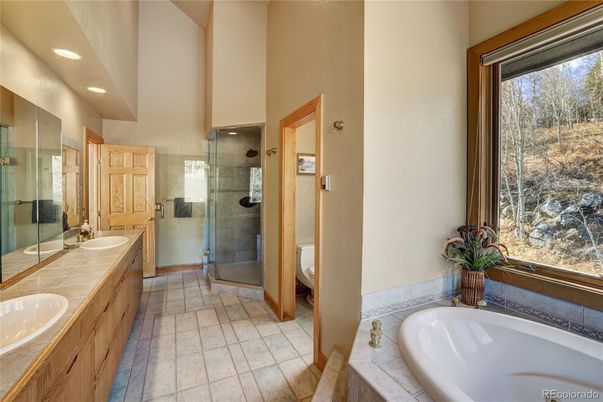 Bathroom, Dual Sink Vanities, Glass Shower, Interior, Recessed Lighting, Tile Countertops