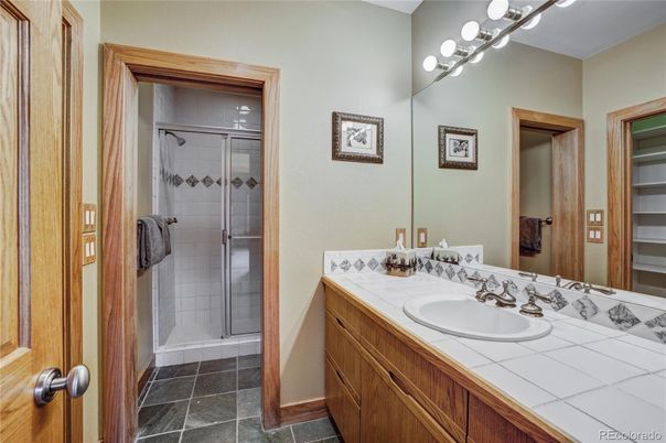 Bathroom, Dual Sink Vanities, Glass Shower, Interior, Tile Countertops