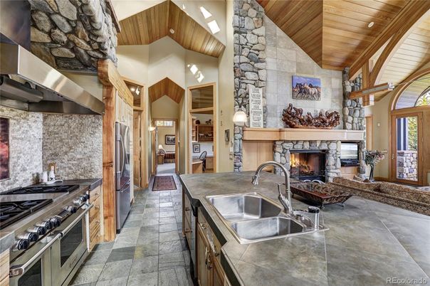 Fireplace, Interior, Kitchen, Stainless Steel Appliances, Stone Walls, Wooden Ceilings