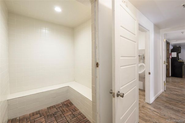 Bathroom, Interior, Recessed Lighting, Washer, Wood Texture Flooring