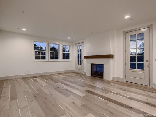 Empty room, Fireplace, Interior, Recessed Lighting, Wood Texture Flooring