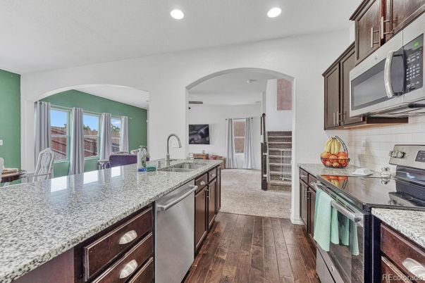Dining room, Interior, Kitchen, Recessed Lighting, Stainless Steel Appliances, Wood Texture Flooring