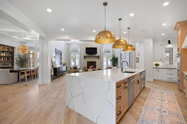 Dining room, Fireplace, Interior, Kitchen, Living room, Pendant Lights, Recessed Lighting, Stainless Steel Appliances, Wood Texture Flooring