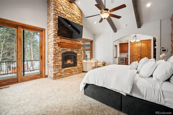 Bedroom, Fireplace, Interior, Recessed Lighting, Stone Walls, Wooden Beams