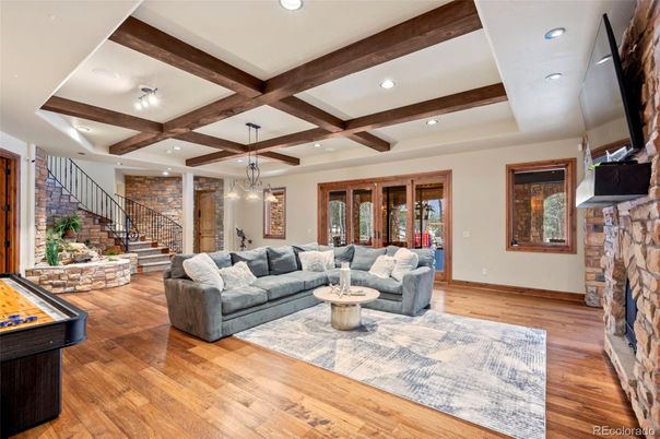 Fireplace, Interior, Living room, Recessed Lighting, Stone Walls, Wooden Beams, Wood Texture Flooring