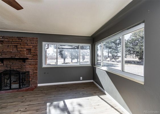 Empty room, Fireplace, Interior, Stone Walls, Wood Texture Flooring