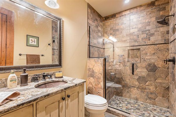 Bathroom, Glass Shower, Interior, Recessed Lighting, Stone Walls