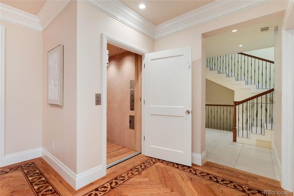 Elevator, Interior, Recessed Lighting, Wood Texture Flooring, Wooden Walls