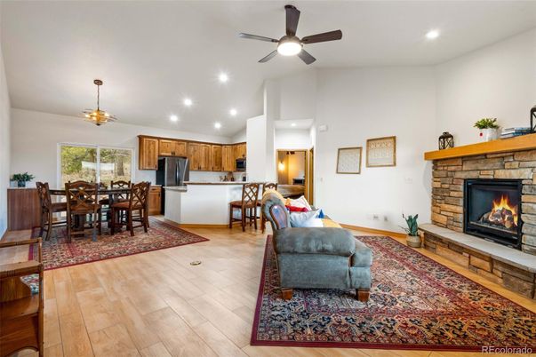 Dining room, Fireplace, Interior, Kitchen, Pendant Lights, Recessed Lighting, Wood Texture Flooring