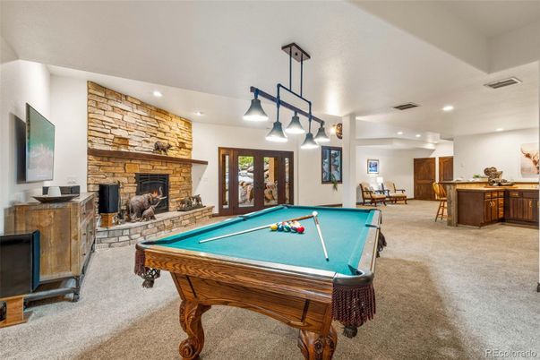 Billiard Table, Fireplace, Game Room, Interior, Pendant Lights, Recessed Lighting, Stone Walls