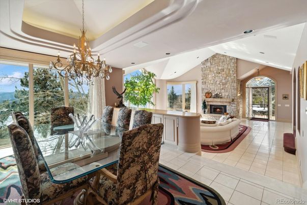 Chandelier, Dining room, Fireplace, Interior, Living room, Recessed Lighting, Stone Walls