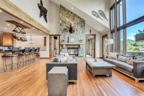 Fireplace, Interior, Kitchen, Living room, Pendant Lights, Recessed Lighting, Stone Walls, Wooden Beams, Wood Texture Flooring