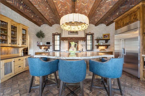 Interior, Kitchen, Pendant Lights, Stainless Steel Appliances, Stone Walls