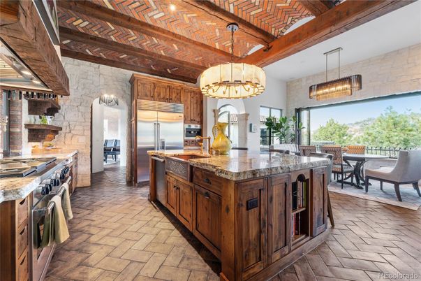 Chandelier, Interior, Kitchen, Pendant Lights, Stainless Steel Appliances, Stone Walls, Wooden Beams, Wooden Ceilings, Wood Texture Flooring