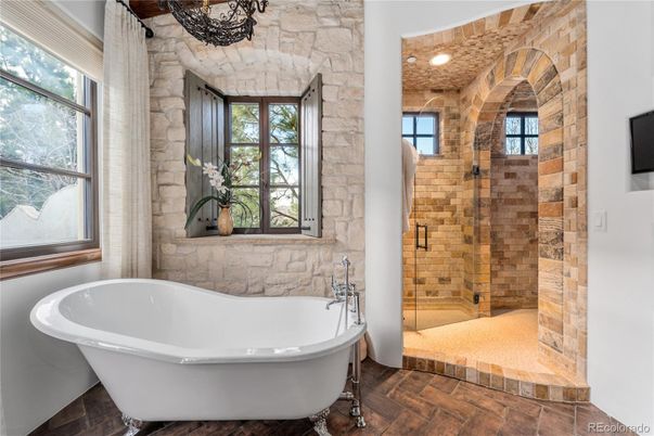 Bathroom, Free Standing Baths, Glass Shower, Interior, Recessed Lighting, Stone Walls