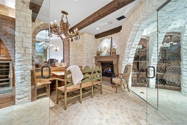 Chandelier, Fireplace, Interior, Recessed Lighting, Stone Walls, Wooden Beams
