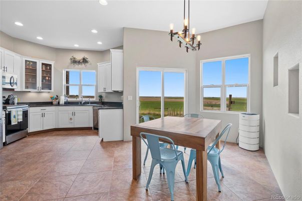 Chandelier, Dining room, Interior, Kitchen, Recessed Lighting, Stainless Steel Appliances