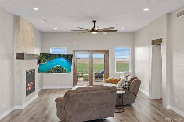 Fireplace, Interior, Living room, Recessed Lighting, Wood Texture Flooring